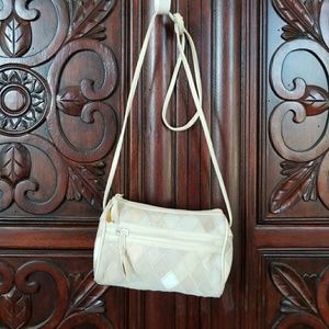 Diamond patchwork leather sling purse